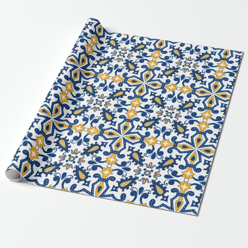 The Sardine Sampler Kit #1 by Iberica - Pretty Things from Portugal features decorative wrapping paper with a blue, yellow, and white floral-geometric pattern inspired by Mediterranean sardine tin designs.