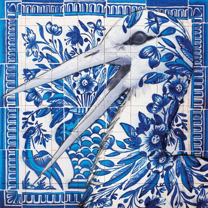 Decorative tile with blue floral patterns and a white bird