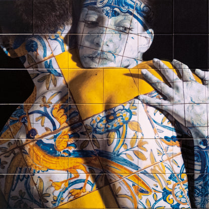 Artistic depiction of a woman holding a yellow box with intricate patterns on a dark background