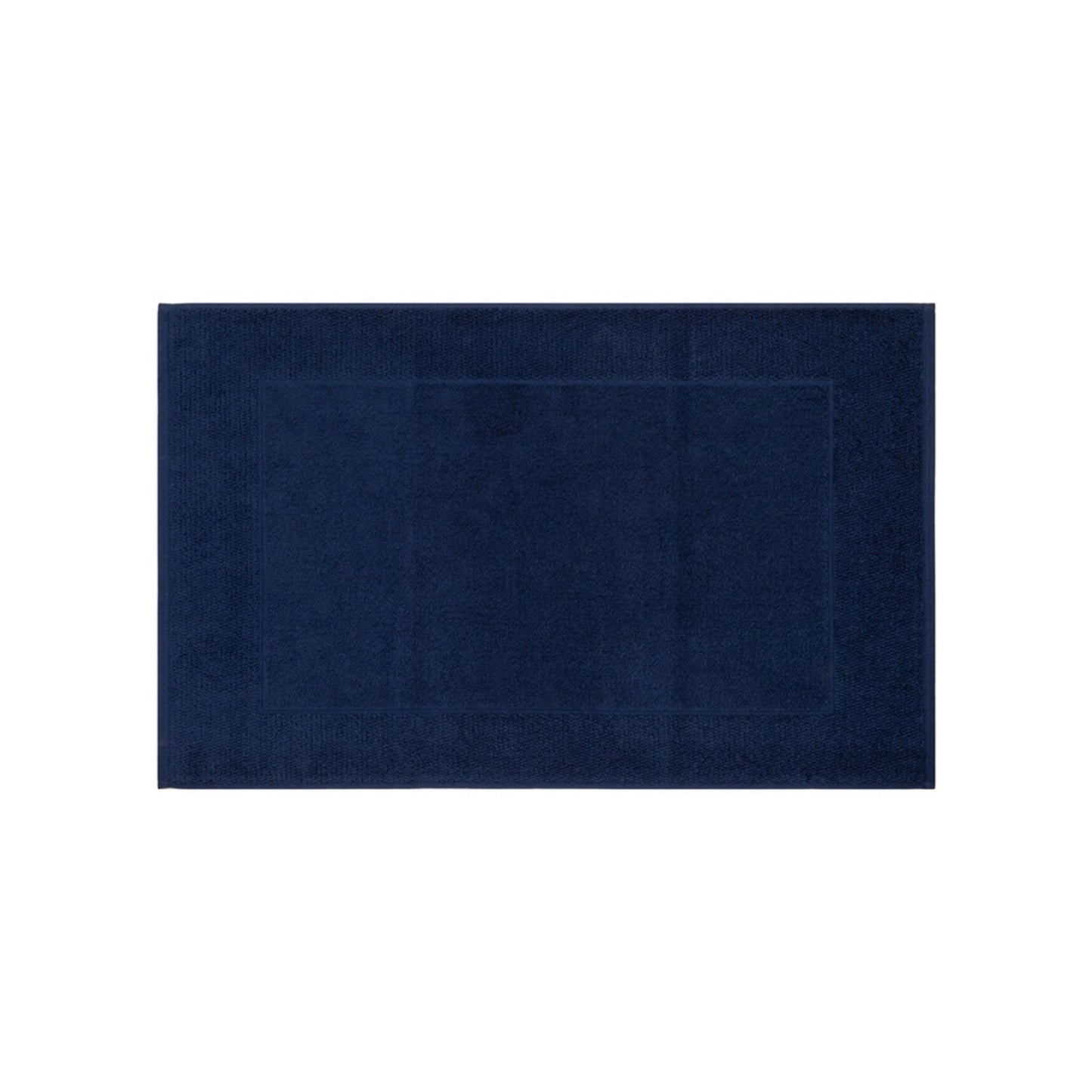 Cobalt blue bath mat in soft, absorbent cotton, Portuguese-made, shown flat with textured terry detail.