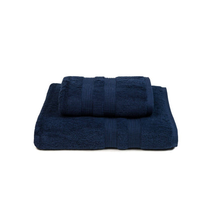 Cobalt towel set with bath and hand towels arranged together.