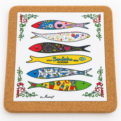The Sardine sampler kit #1 by Iberica – Pretty things from Portugal features a cork-backed tile with six uniquely designed illustrated sardines, floral border, and “Sardinha” text—perfect as a cheese board or serving with Portuguese canned sardines.