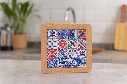 The MB Cork Cork Trivet with Portuguese Azulejo Print - L851 (Individual) showcases vibrant patterns and "Portugal," making it a stylish addition to any kitchen counter.