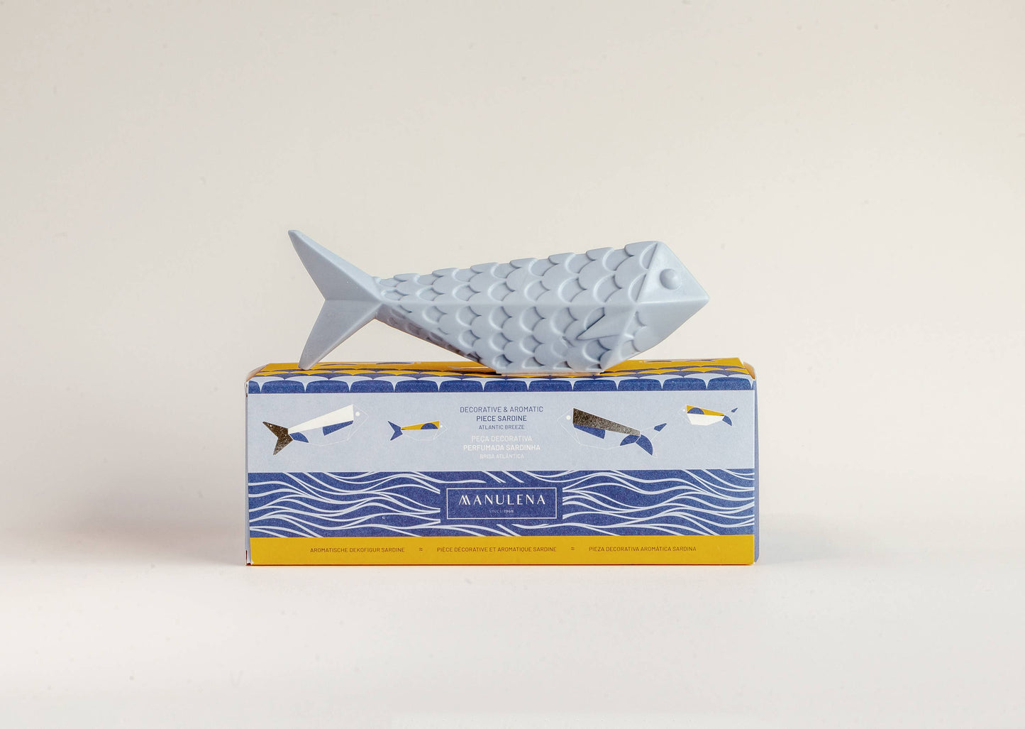 Blue wax sardine displayed as decorative home accessory inspired by Portuguese coast