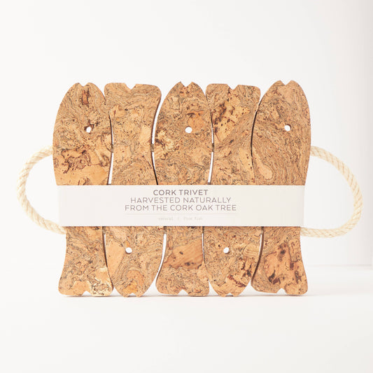 The LIGA Natural Cork Trivet - Fish features five cork pieces connected by rope, with a paper band stating “Cork Trivet Harvested Naturally from the Cork Oak Tree.” Eco-friendly and crafted in Portugal, shown against a white background.