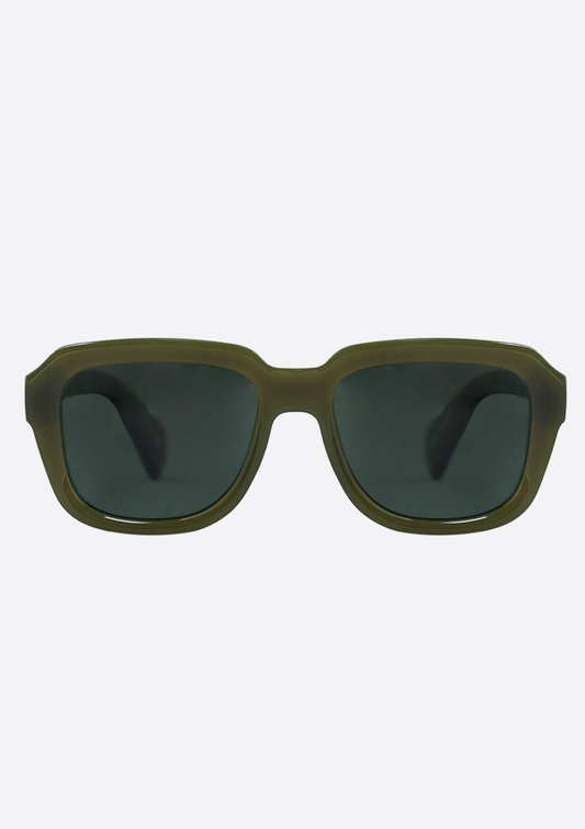 The Petrea Low Verde Sunglasses by Oceanides feature an olive green rectangular frame made from recycled plastic and dark polarized lenses, shown front-facing against a plain white background.