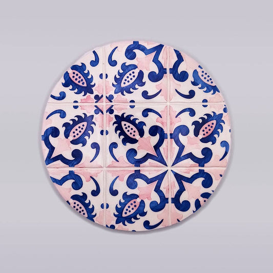 Hand painted blue and pink ceramic trivet