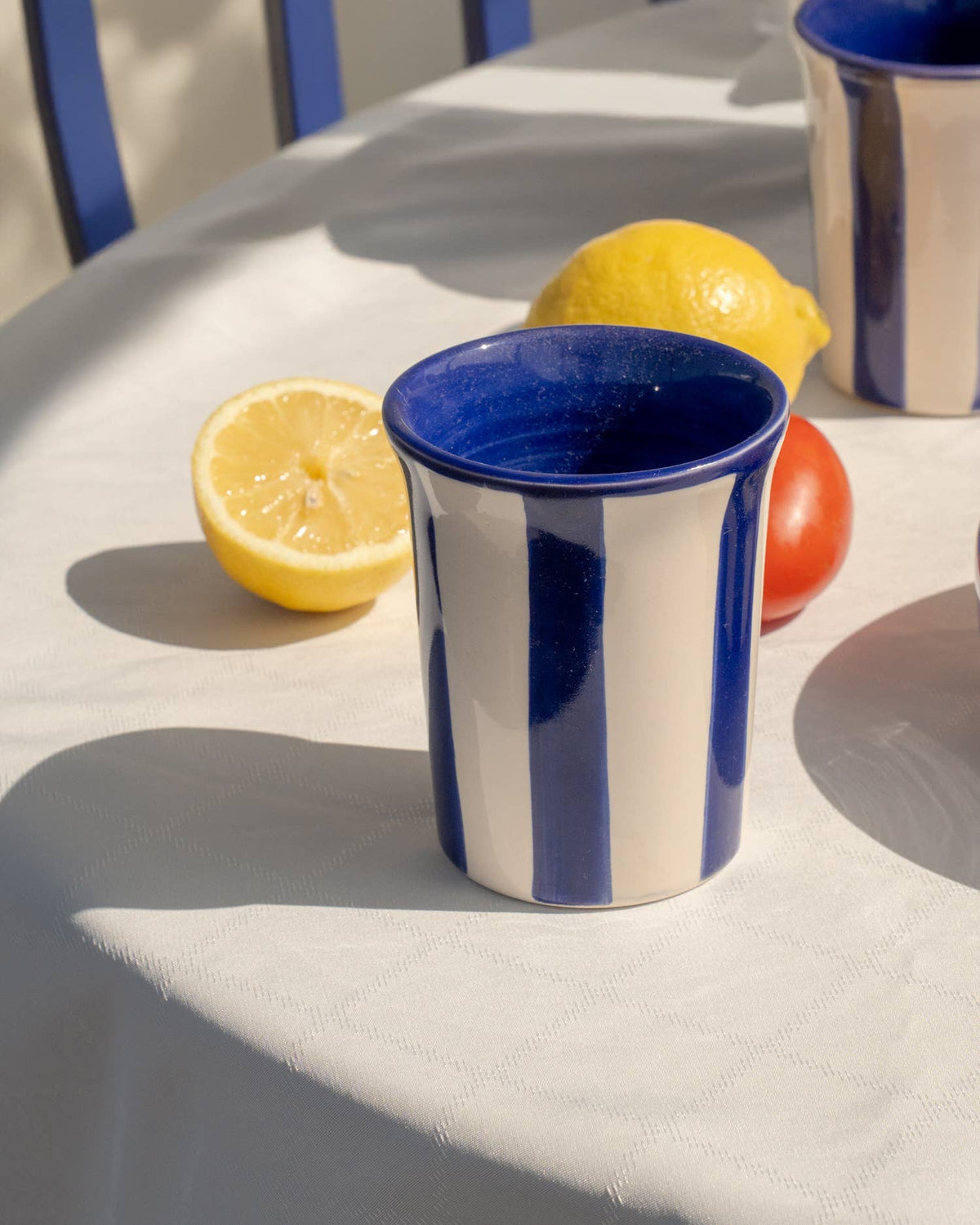 Costa Azul blue and white striped ceramic mug handmade in Spain