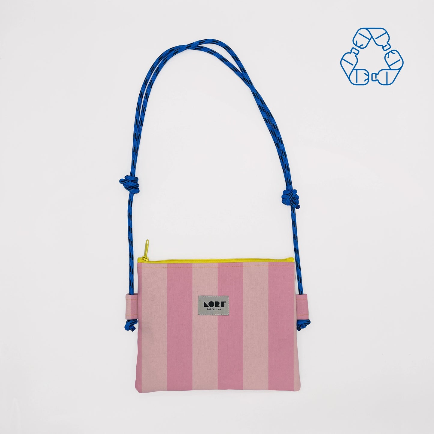 A pink and light pink vertically striped zippered pouch bag with a blue braided shoulder strap and a yellow zipper trim. The brand name 'LOFT' is visible on the front label.