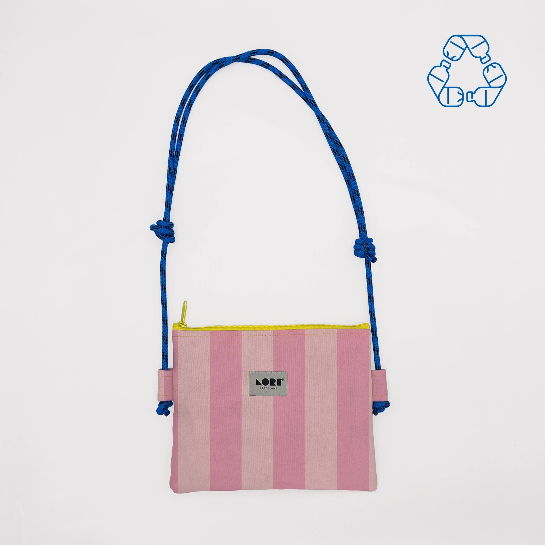 A pink and light pink vertically striped zippered pouch bag with a blue braided shoulder strap and a yellow zipper trim. The brand name 'LOFT' is visible on the front label.