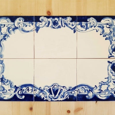 The TilePassion Bespoke Outdoor House Address Portuguese Tile Mural in Cobalt Blue features six white ceramic tiles with a blue baroque border and blank centers—perfect for custom house number plaques with authentic Portuguese charm.