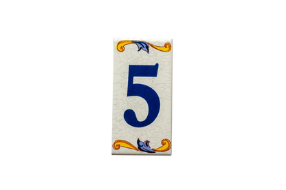 Lisa Croquets Numbers – Ceramic House Number Tiles: a rectangular ceramic tile featuring the blue number 5 with decorative yellow and blue flourishes at the top and bottom.