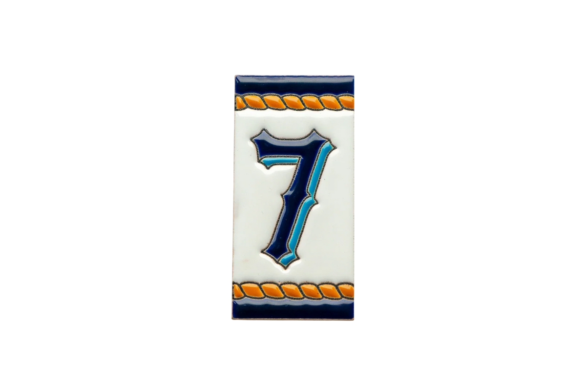 LVR Ceramics Marine Ceramic House Number & Letter Tile: a rectangular Mediterranean tile featuring the number seven in blue and teal with orange rope-style borders.