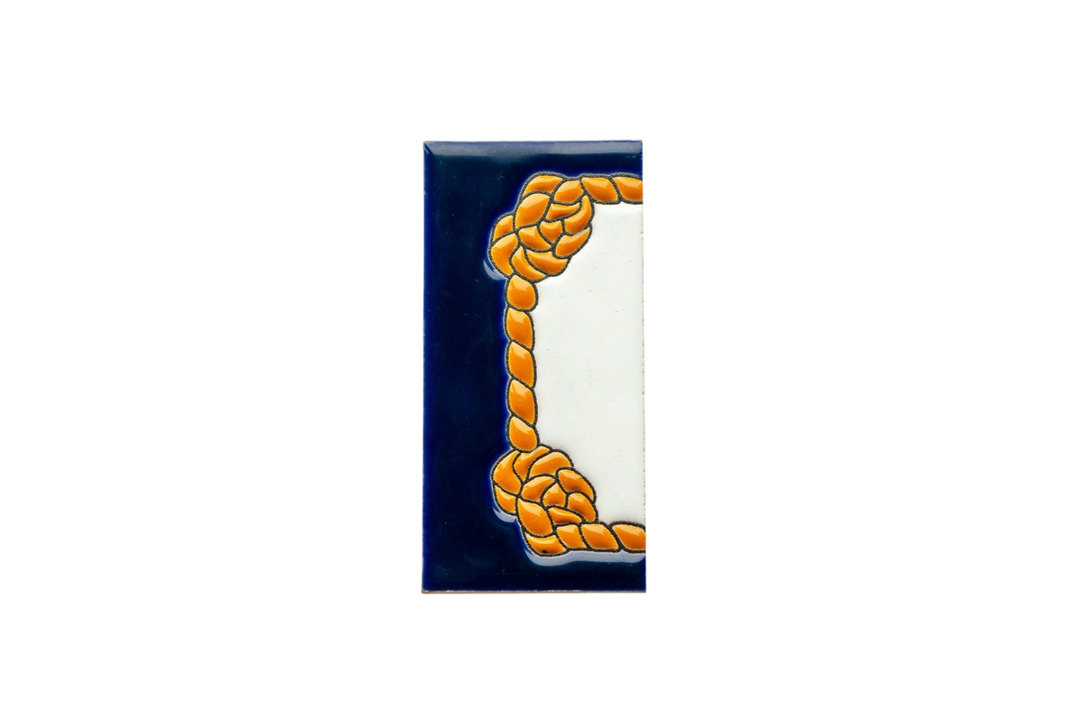 LVR Ceramics Marine Ceramic House Number & Letter Tile: a rectangular ceramic tile with a white center and deep blue border featuring an orange rope pattern, designed in a Mediterranean style.