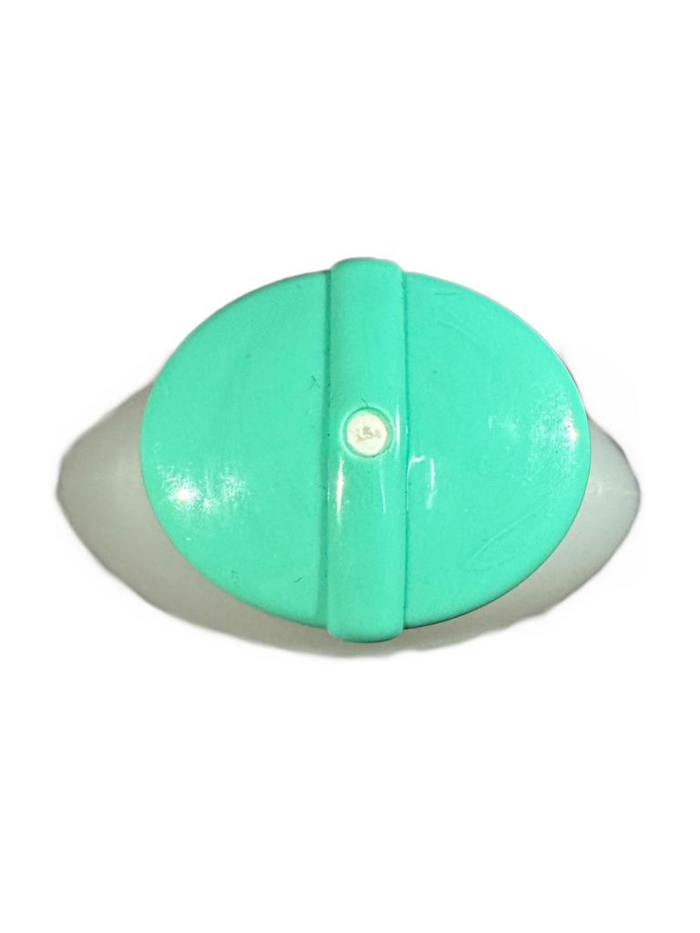 Detail of Nenuco Original Cologne bottle and cap