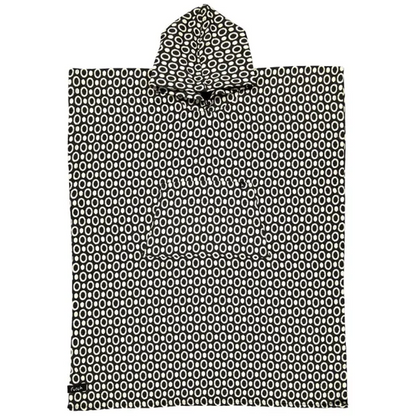 The Pulse Cotton Beach Poncho by Futah is a premium Portuguese surf and beach poncho crafted from cotton, featuring a black and white oval geometric pattern. Its rectangular shape, centered hood, and practical front pocket make it both stylish and functional for seaside adventures.