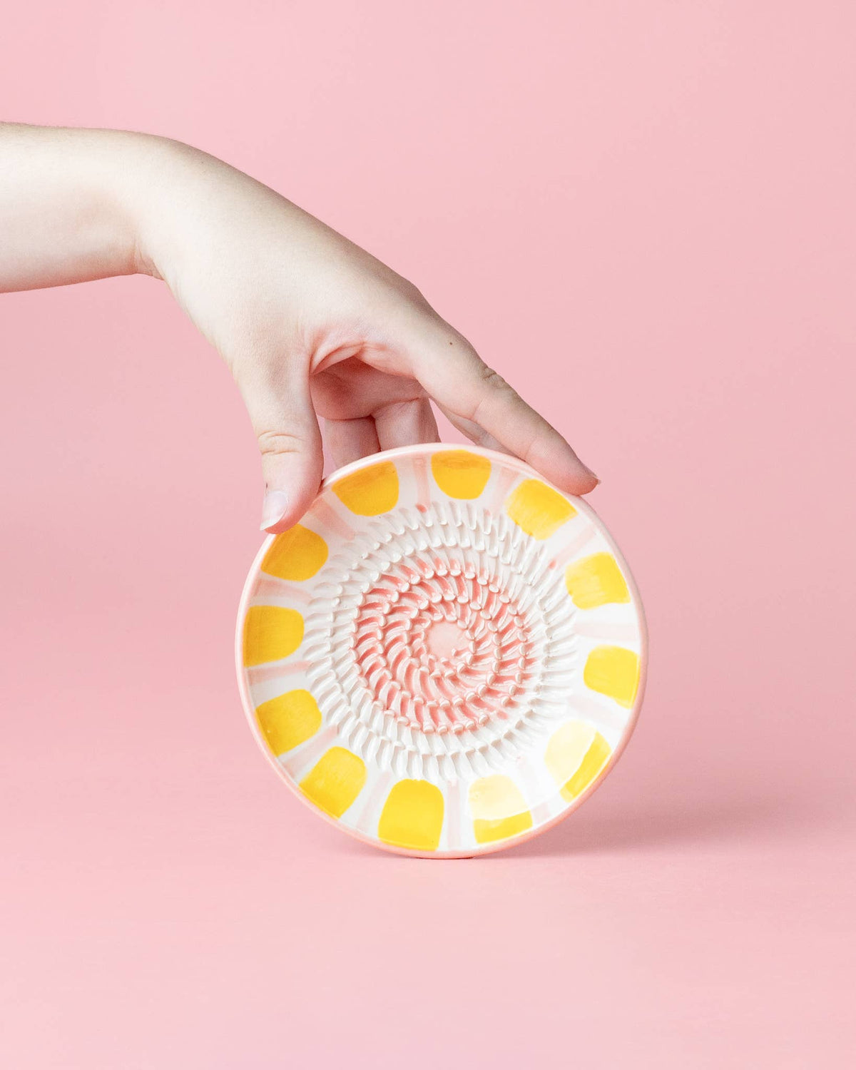Valentina ceramic garlic grater plate in pink and yellow