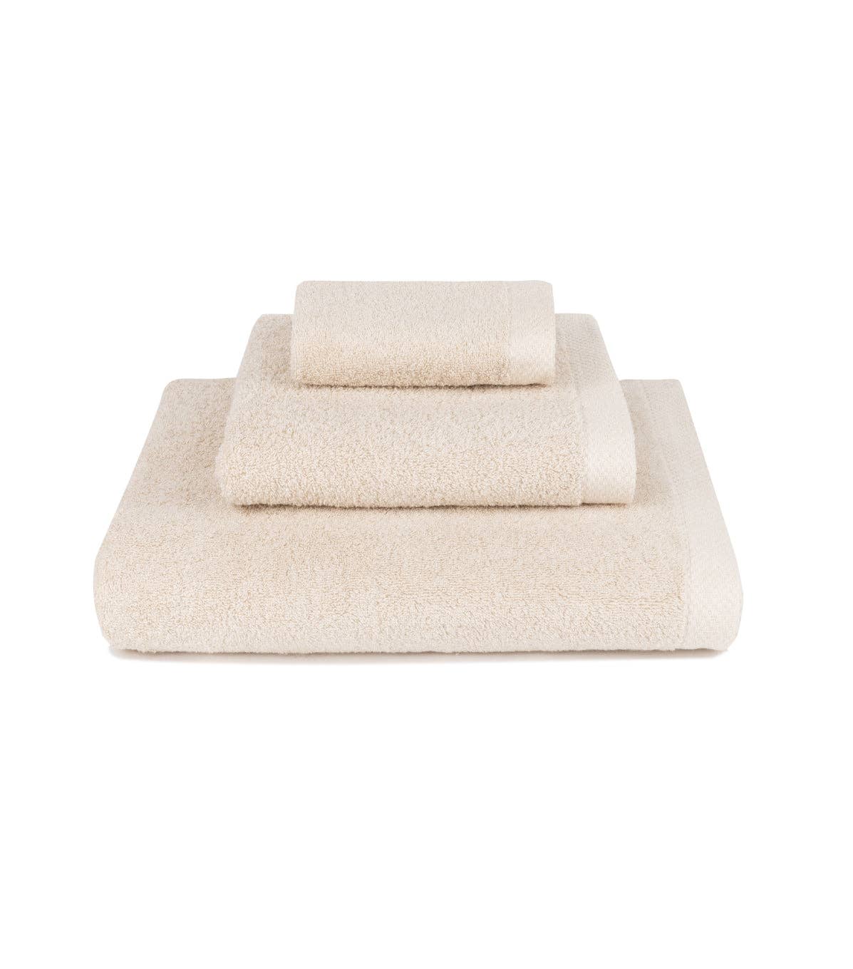 Image of Natural Torres Novas X Zero 3 piece towel set stacked